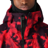 The 686 Gateway Shell Jacket 2025 is predominantly red with black accents and has a black zipper running down the front.