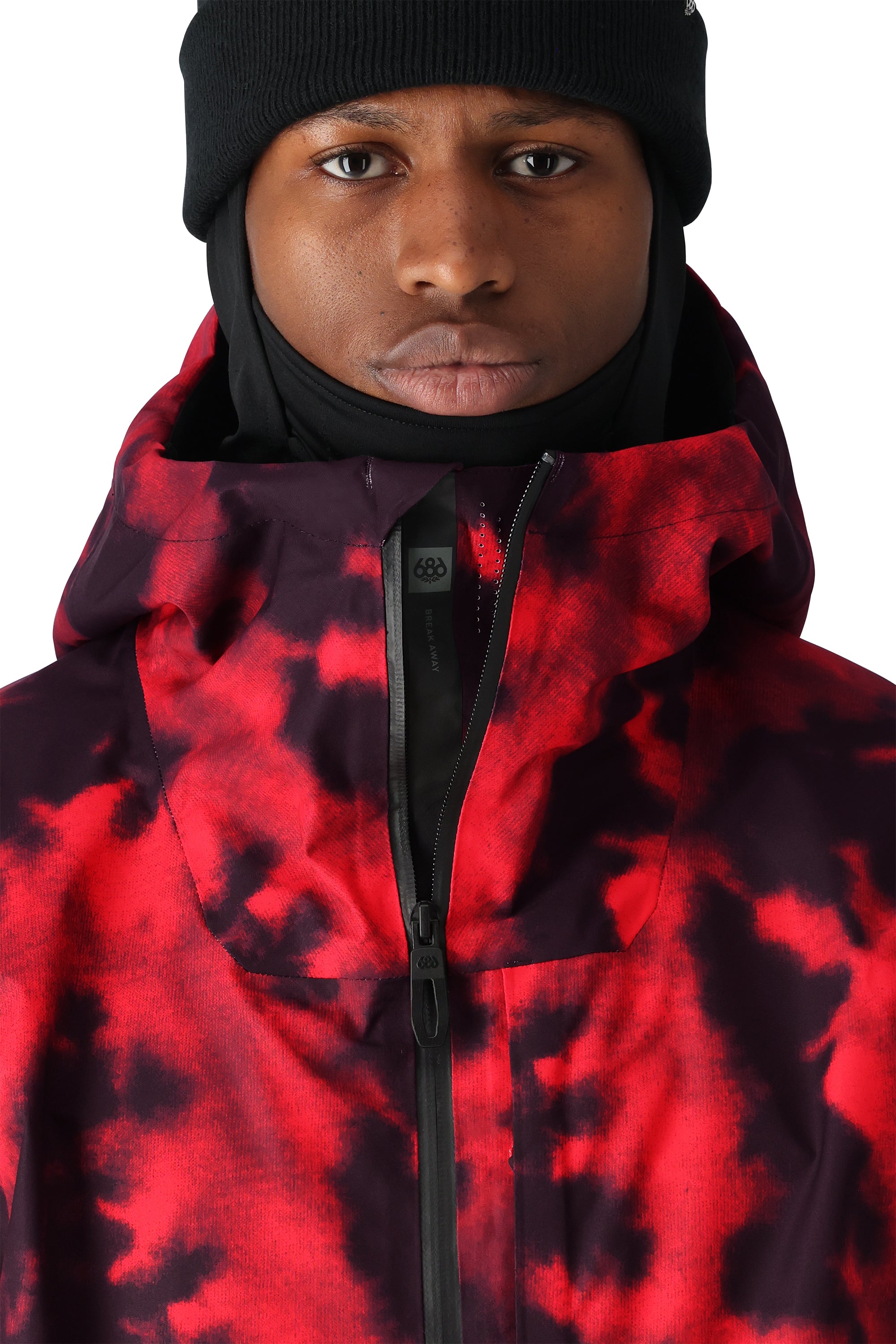 The 686 Gateway Shell Jacket 2025 is predominantly red with black accents and has a black zipper running down the front.