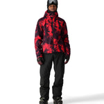 The 686 Gateway Shell Jacket 2025 is red and black with an abstract pattern.