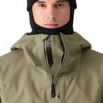 The 686 Gateway Shell Jacket 2025 is showcased in this image, featuring a light brown color with an insulated hood and a front zipper.