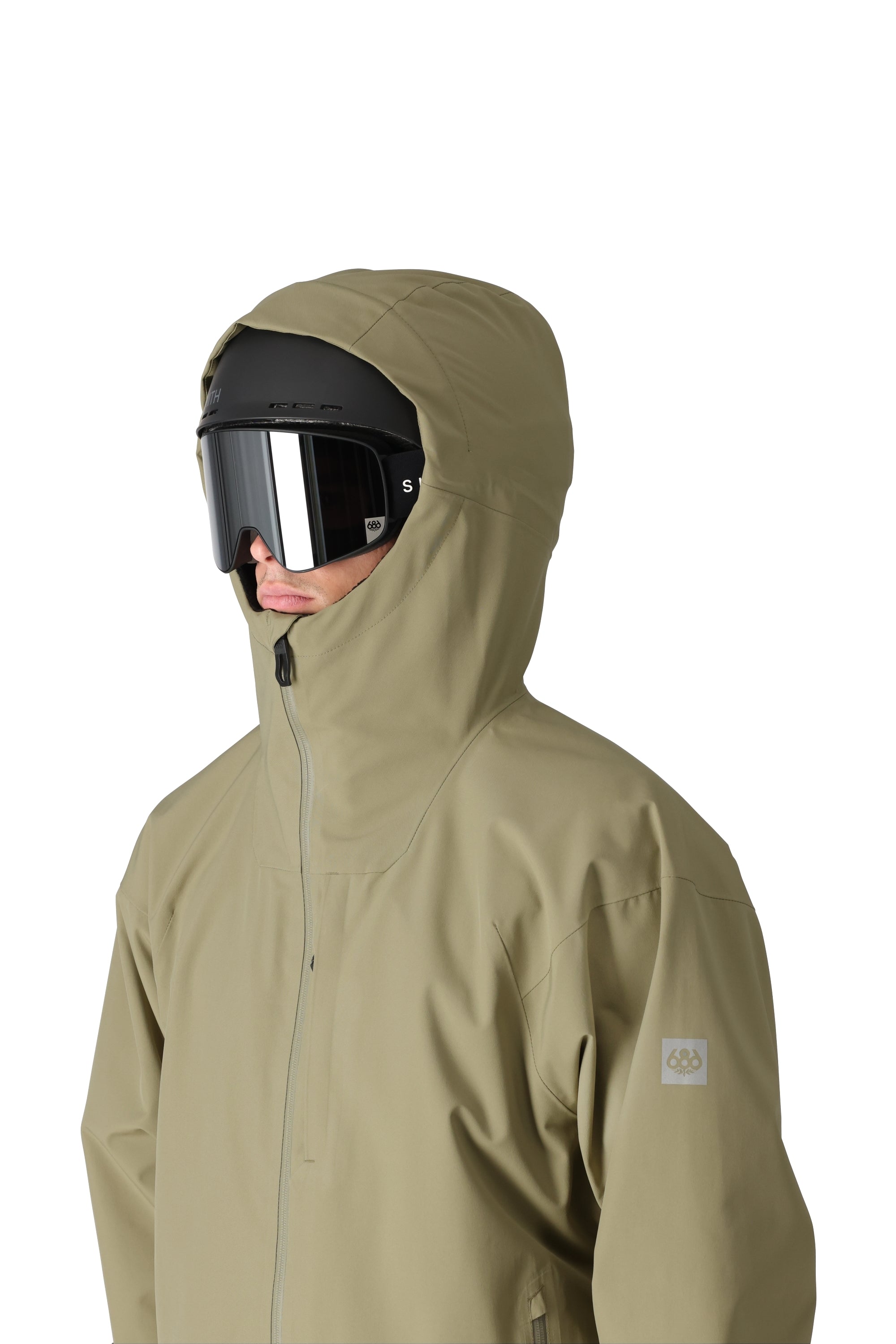 The 686 Gateway Shell Jacket 2025 is primarily olive green with an insulated hood and a front zippered pocket.
