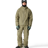 The 686 Gateway Shell Jacket 2025 is primarily khaki green with a black hood and zipper.
