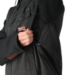 The 686 Iron Maiden Insulated Battle Jacket has an iron maiden logo on the front in white and red.