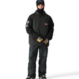 The 686 Iron Maiden Insulated Battle Jacket 2025 has a black front view with an embroidered Iron Maiden logo on the left chest and red accents.