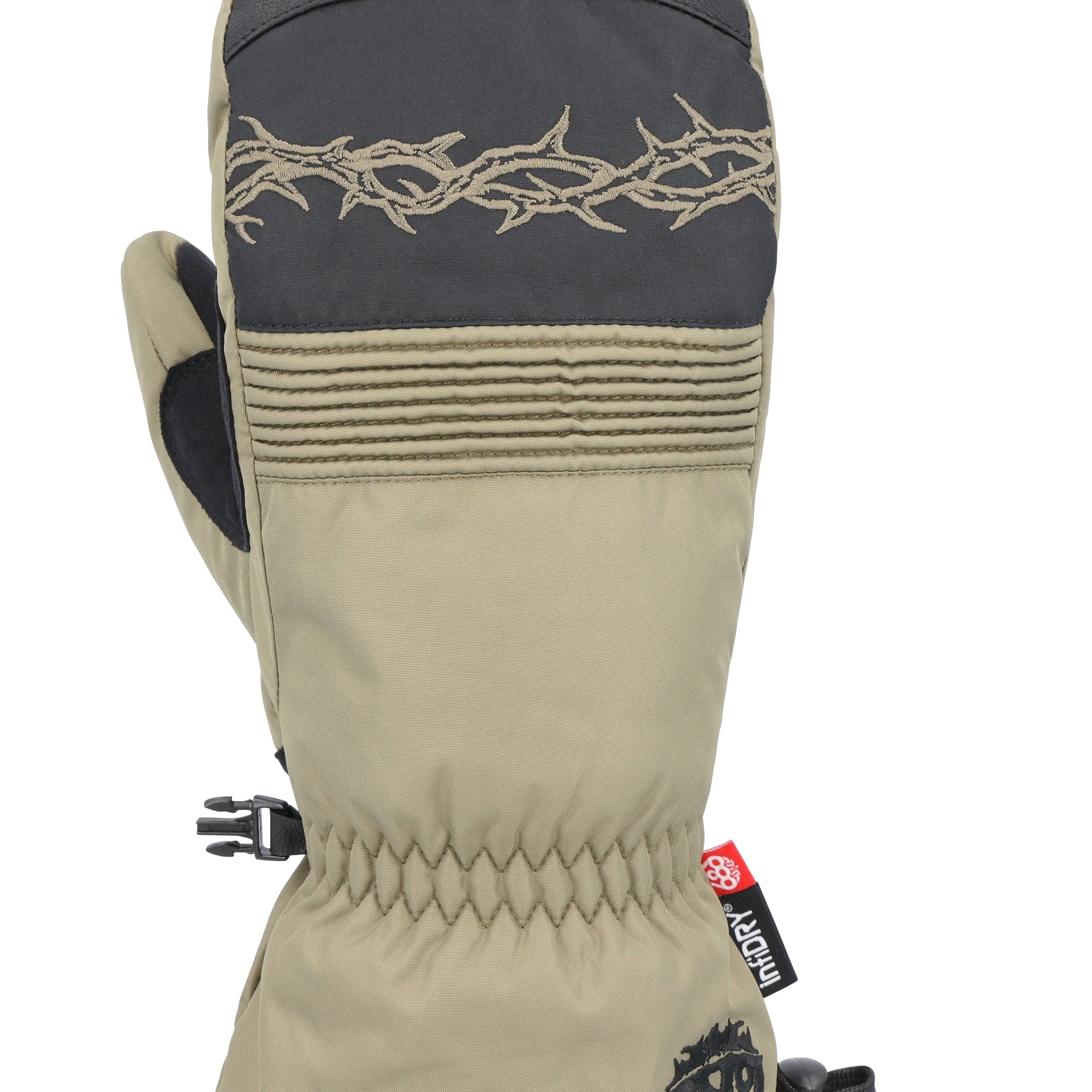 The 686 Men's Lander Mitt 2025 is primarily tan with a black leather cuff and an embroidered twined rope design at the top.