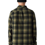 The 686 Men's Sierra Fleece Flannel 2025 is depicted in a dark green and black plaid pattern on a light background.