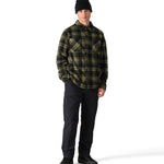 The 686 Sierra Fleece Flannel 2025 in green and black plaid features two chest pockets with flap closures.