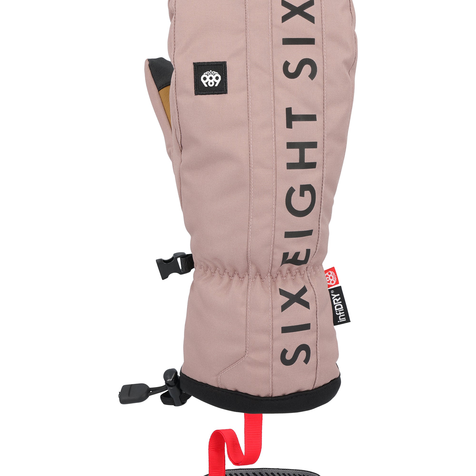 The 686 Team Merino Mitt for men has a tan color and a distinctive insulated hood.