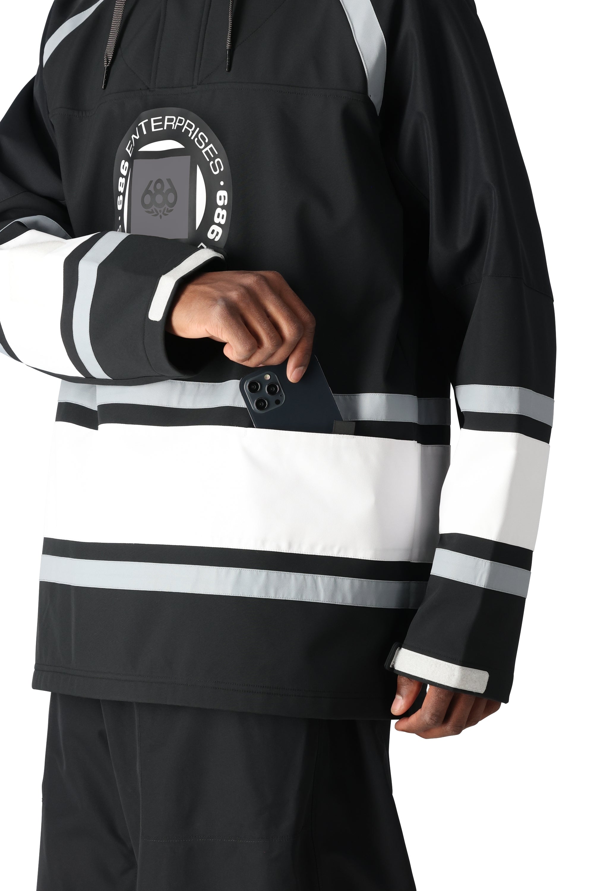 The 686 Waterproof Slapshot Hoody 2025 is black with white stripes and an insulated hood.
