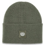The 686 Women's Big Cuff Beanie 2025 is a forest green beanie with ribbed cuffs and a rolled hem.