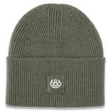 The 686 Women's Big Cuff Beanie 2025 is a forest green beanie with ribbed cuffs and a rolled hem.
