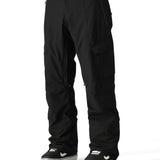 The 686 Men's Quantum Thermagraph Pant 2025 is black with two zippered front pockets and a zippered cargo pocket on one leg.