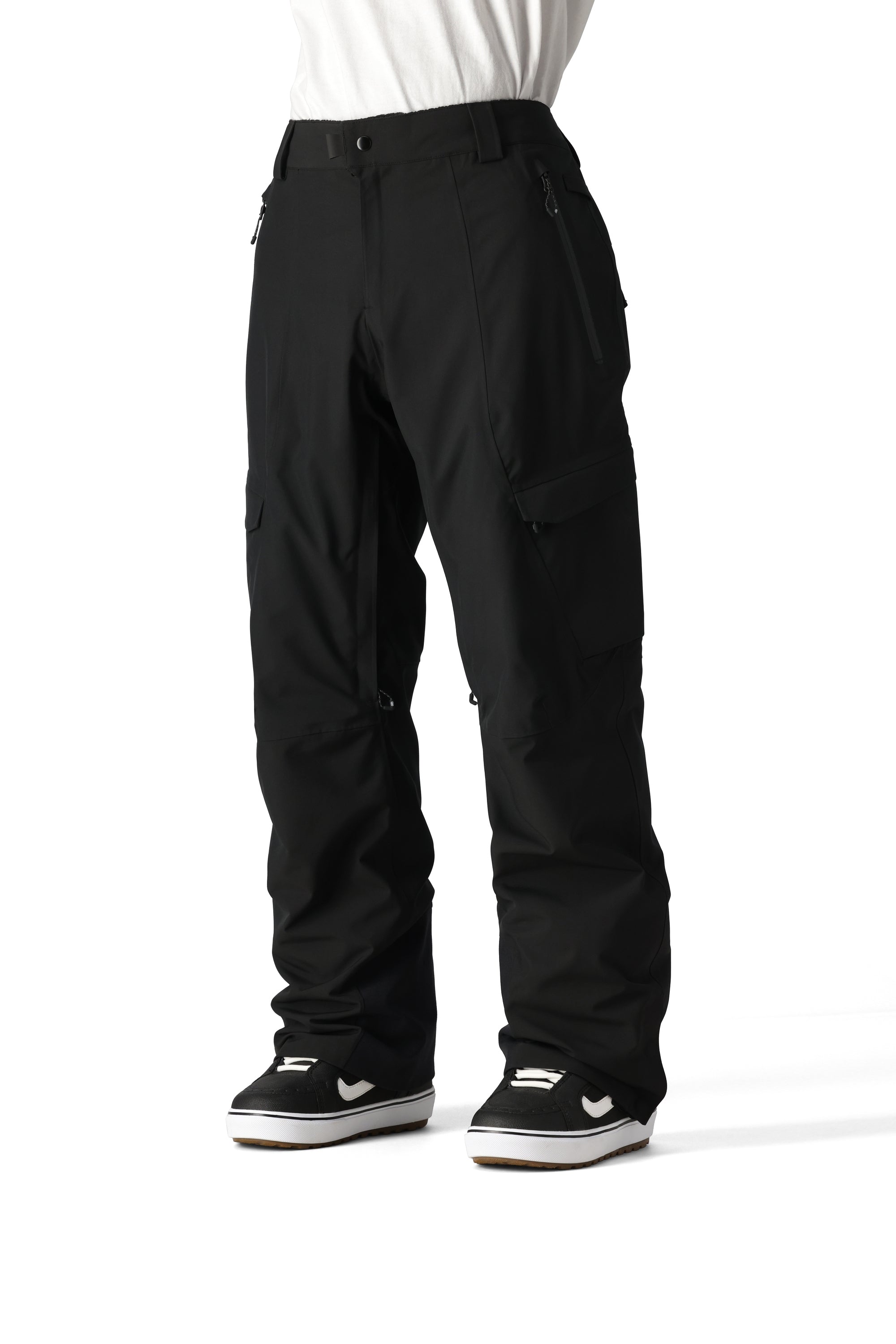 The 686 Men's Quantum Thermagraph Pant 2025 is black with two zippered front pockets and a zippered cargo pocket on one leg.