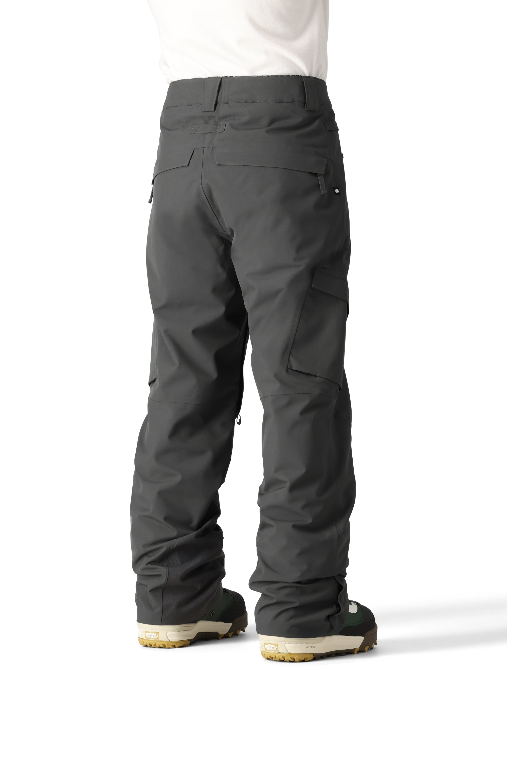 The 686 brand Quantum Thermagraph Pant 2025 appears in black with cargo pockets on the side view.
