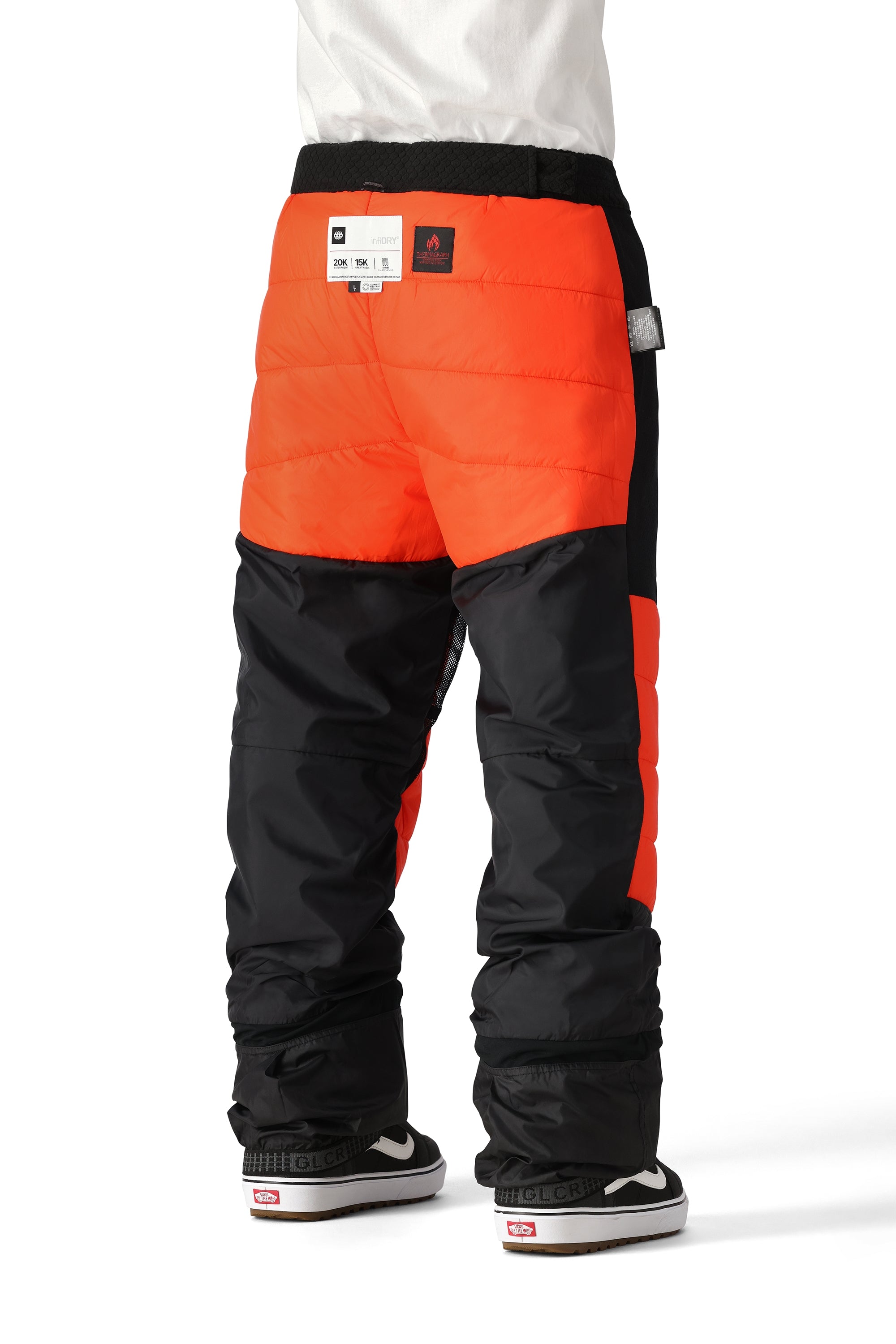 The 686 Quantum Thermagraph Pant in orange and black has an insulated hood.