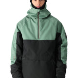 The Renewal Insulated Anorak Jacket by 686 boasts a striking combination of black and sage green hues.