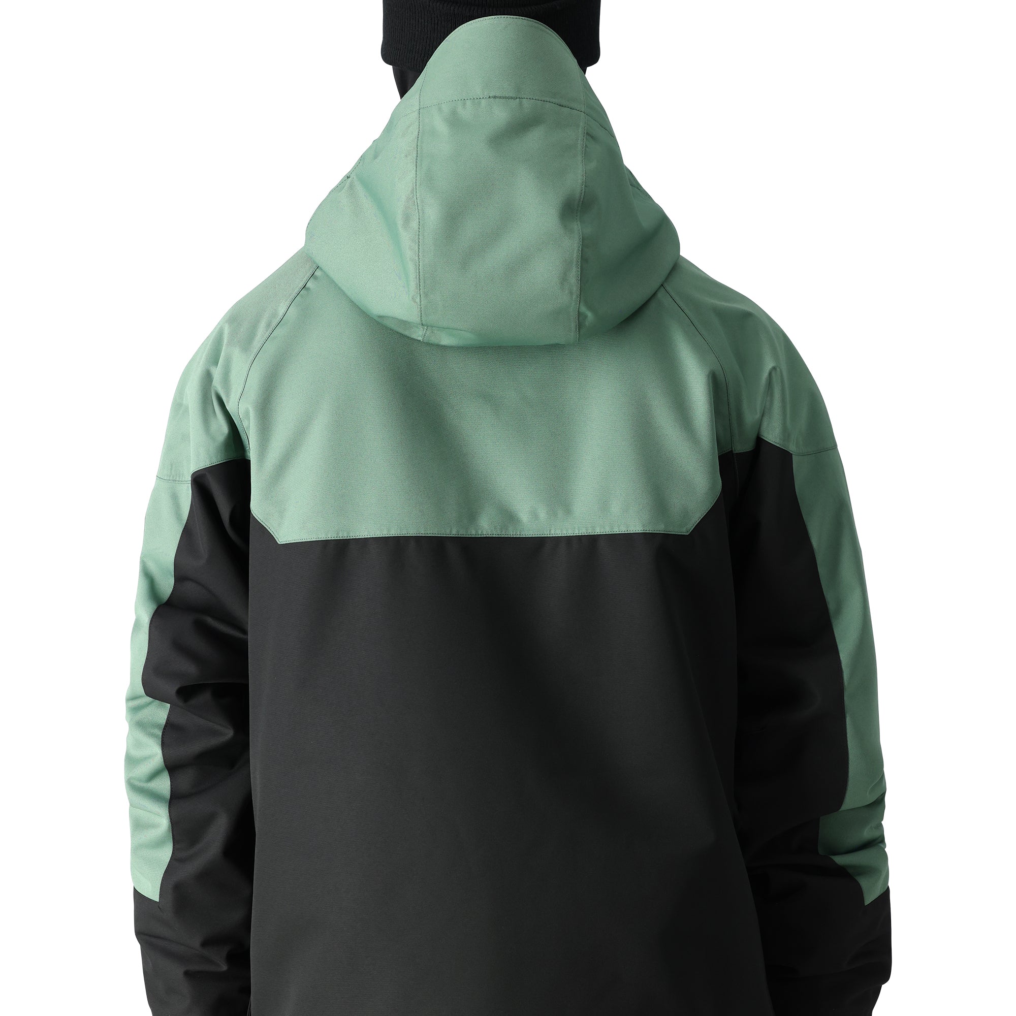 The 686 Renewal Insulated Anorak Jacket in this front view features a black body with mint-green shoulders and hood.