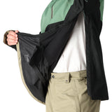 The 686 Renewal Insulated Anorak Jacket 2025 is primarily black with green accents and has a zippered front.
