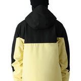 The 686 Renewal Insulated Anorak Jacket features a black and yellow color scheme with an adjustable hood.