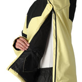 The 686 Renewal Insulated Anorak Jacket has a black body with pale yellow accents and a hood.