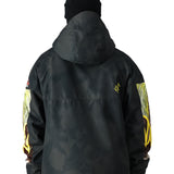 The 686 Renewal Insulated Anorak Jacket 2025 is black with yellow and gray accents on the arms.