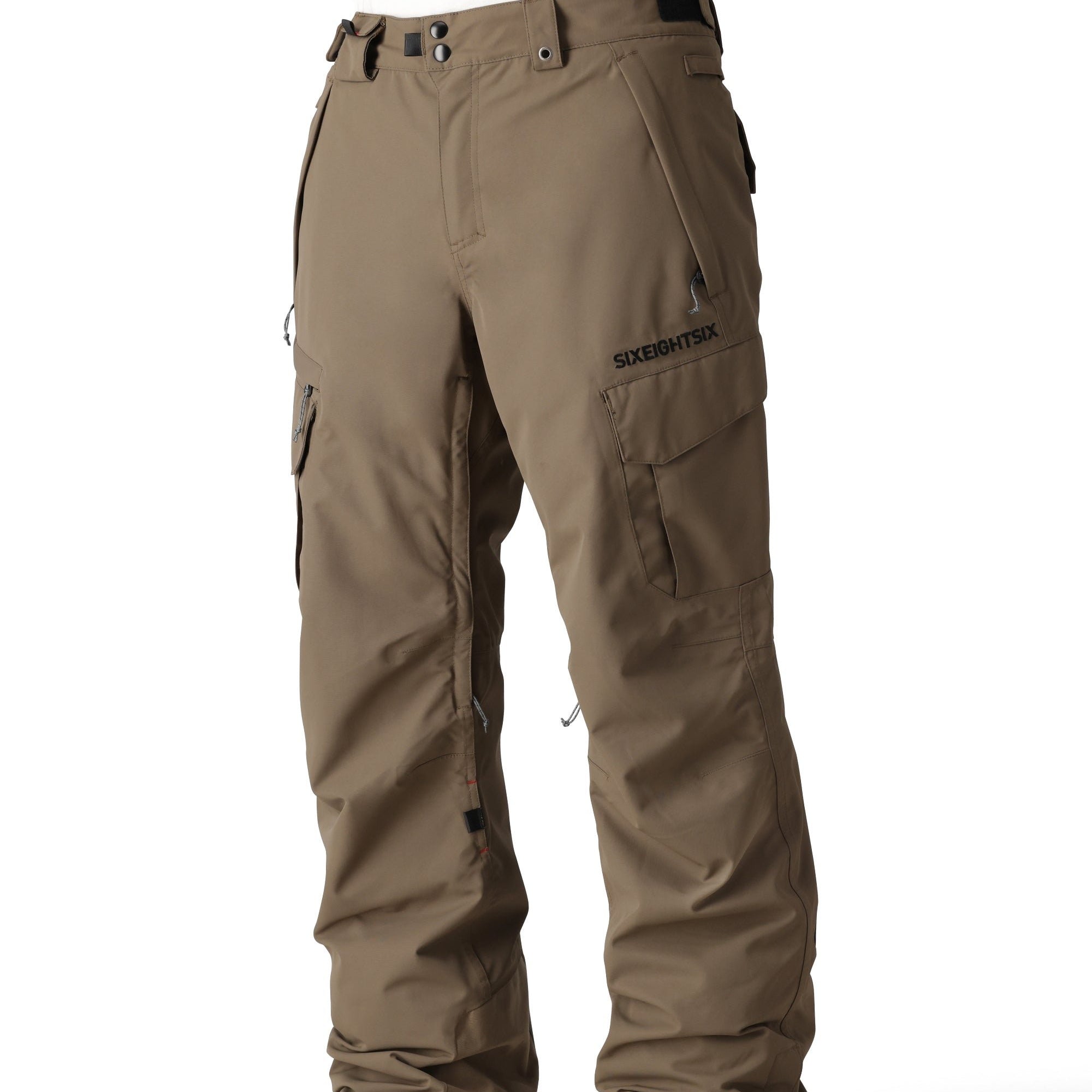 The 686 brand's SMARTY 3-in-1 Cargo Pant features a dark brown color with cargo pockets and a zippered fly.