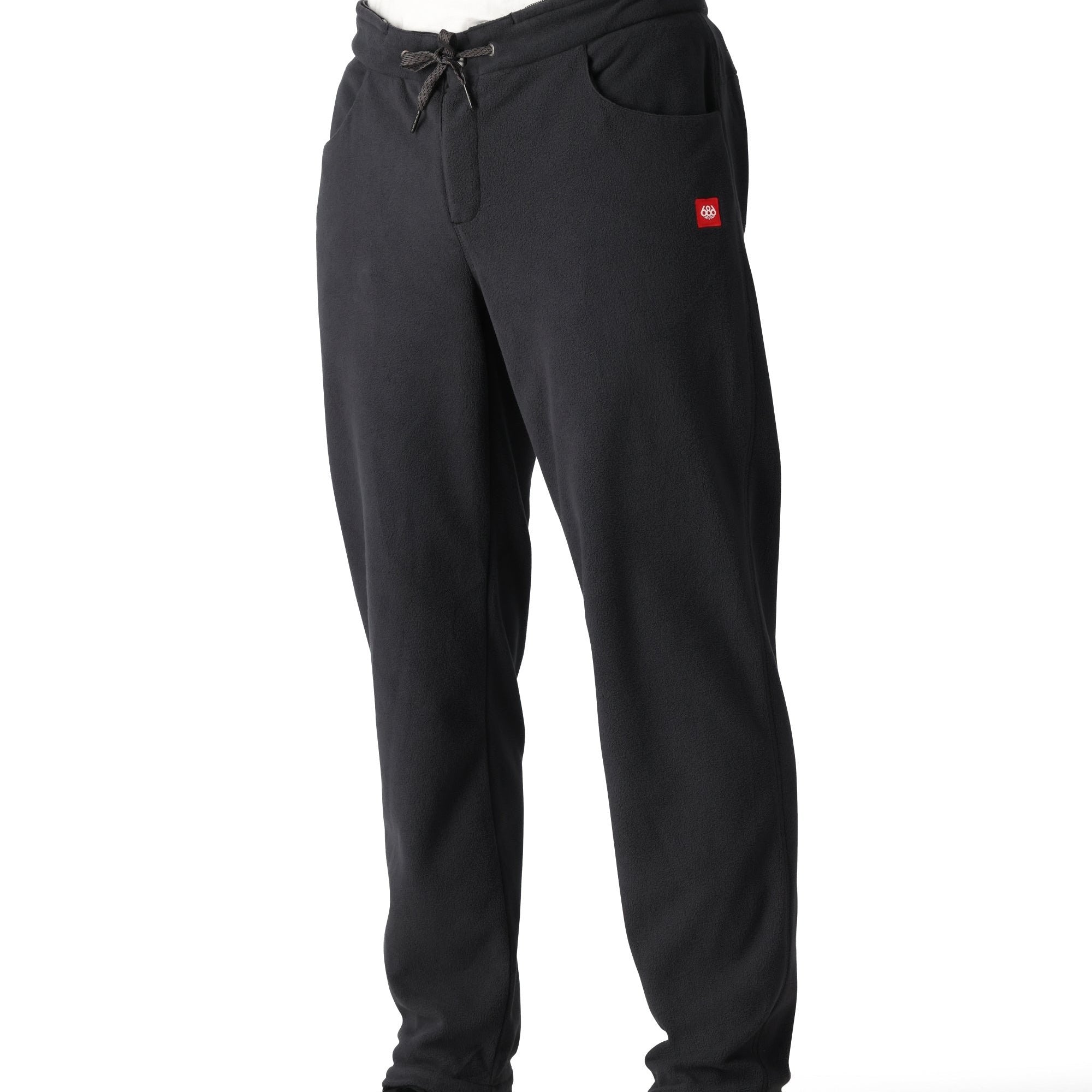 The 686 Men's SMARTY 3-in-1 Cargo Pant 2025 is black with a red logo on the left thigh and has two side cargo pockets.
