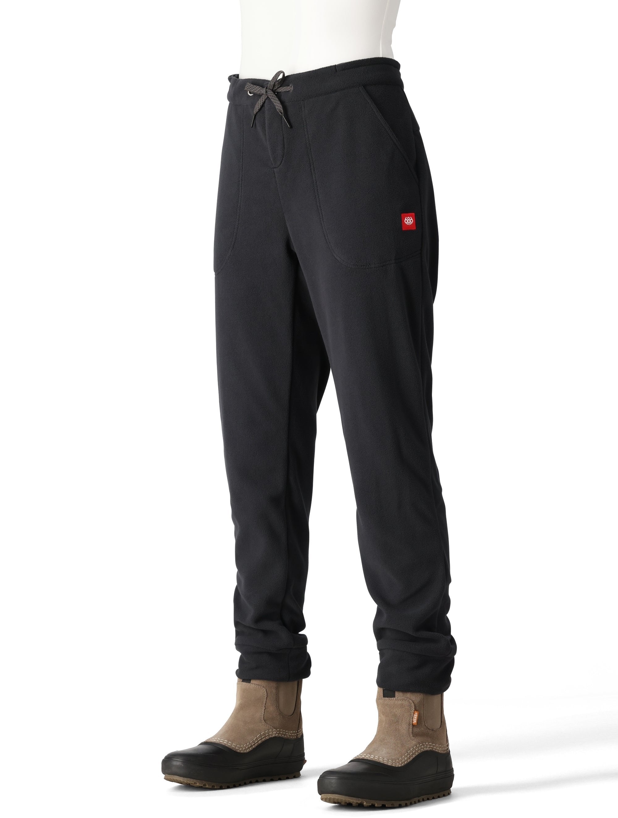 The 686 brand presents the WOMEN'S SMARTY 3-IN-1 CARGO PANT in a dark navy color with white and red accents.