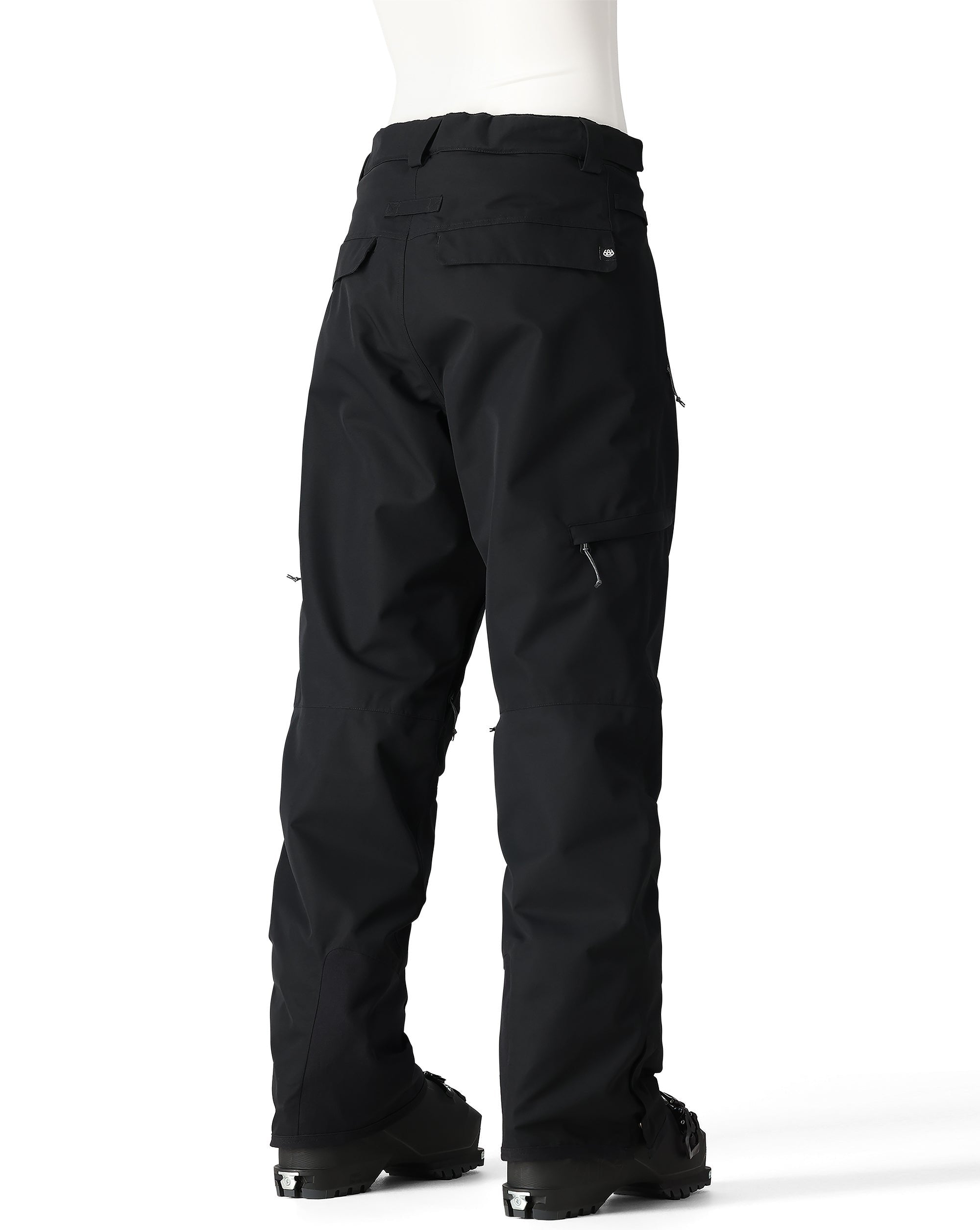 The 686 Women's SMARTY 3-in-1 Cargo Pant 2025 is black with zippered cargo pockets on both legs.