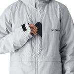 The 686 Smarty 3-in-1 Form Jacket in light gray has a black BOA dial on the wrist.