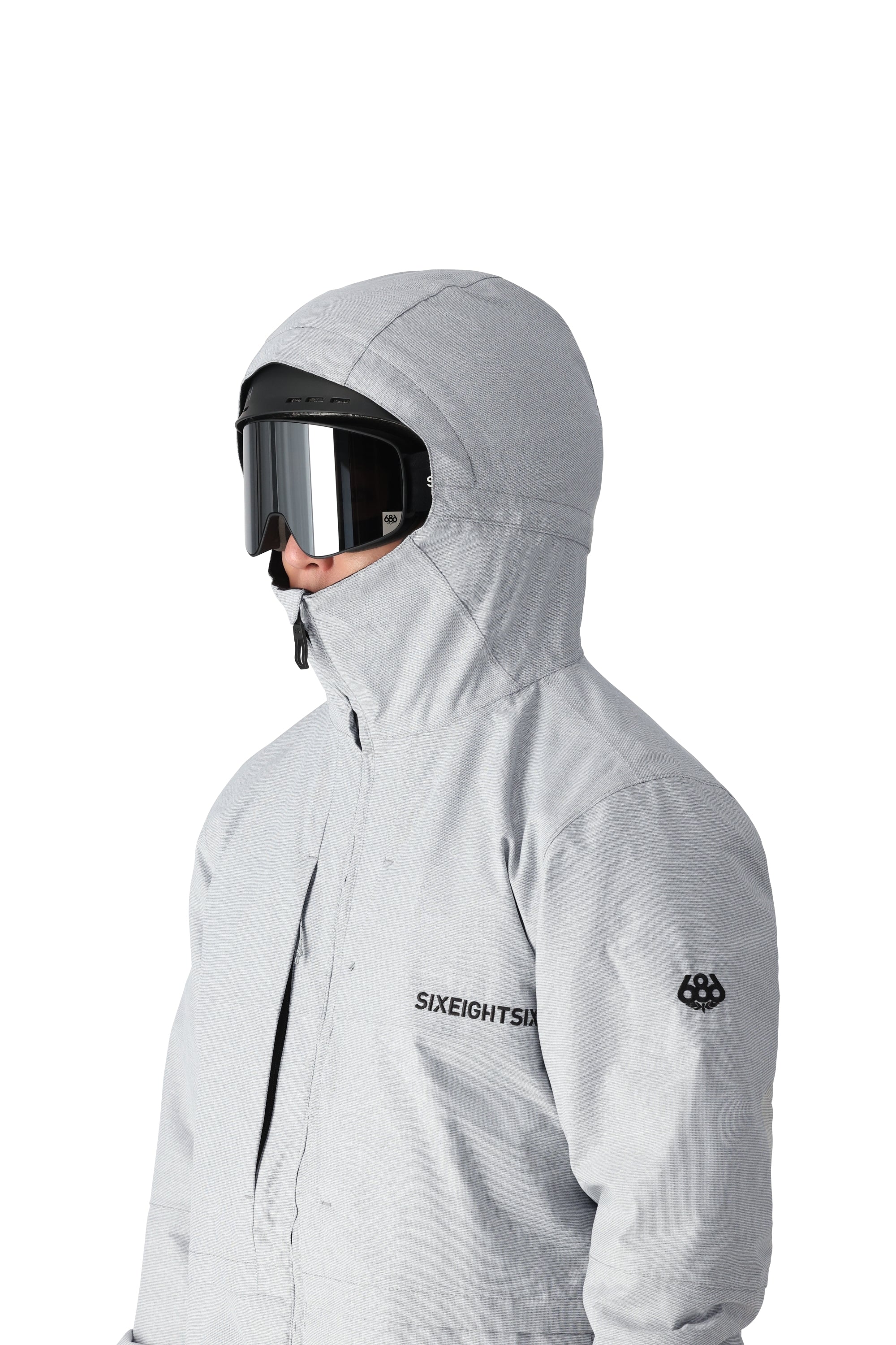 The 686 Smarty 3-in-1 Form Jacket in light gray features a zippered chest pocket and a hood.