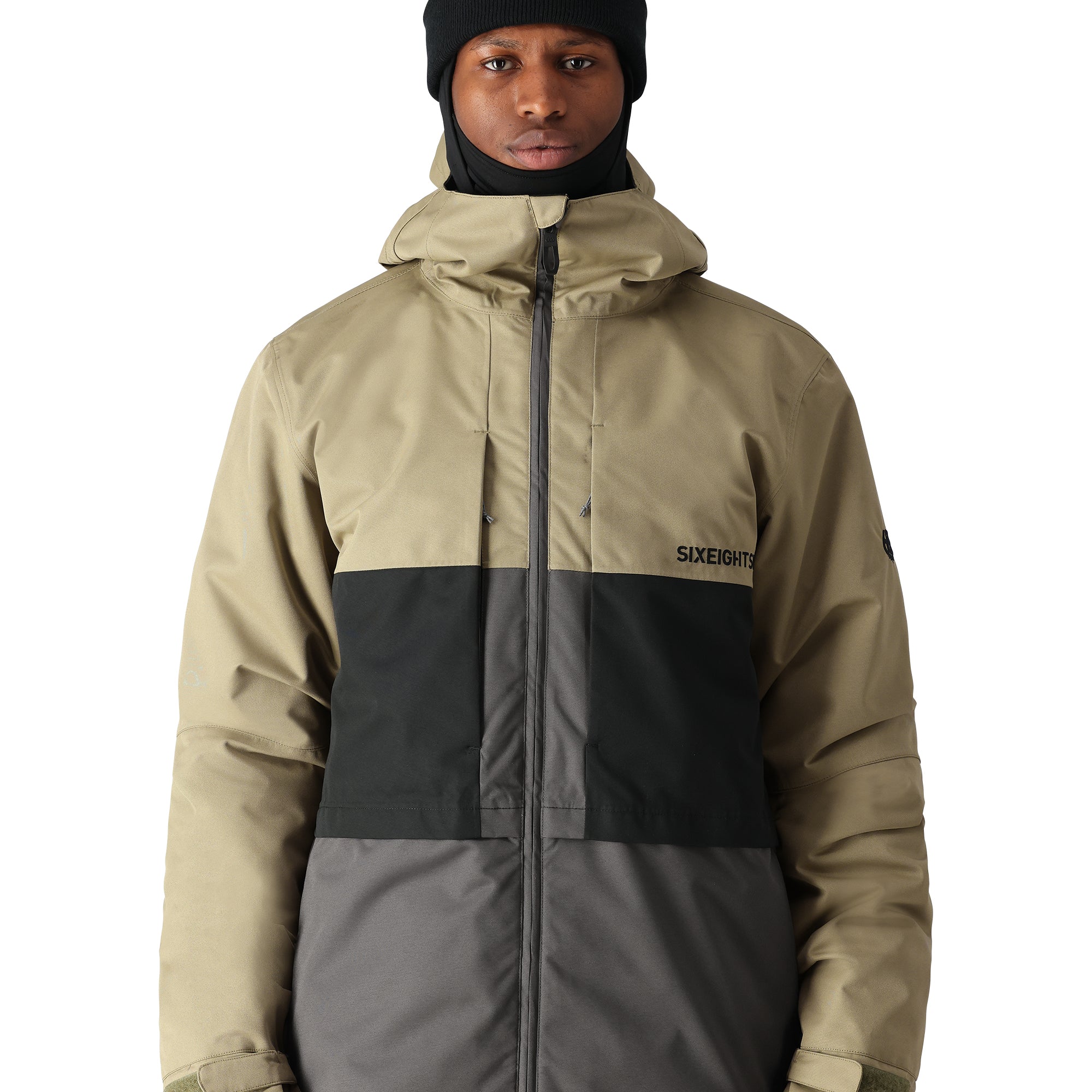 The 686 Smarty 3-in-1 Form Jacket in khaki and black has an insulated hood.
