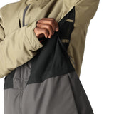 The 686 Smarty 3-in-1 Form Jacket features a tan and gray color scheme with an insulated hood.