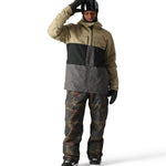 The 686 Smarty 3-in-1 Form Jacket is primarily khaki with a black stripe across the chest and a gray panel at the bottom.