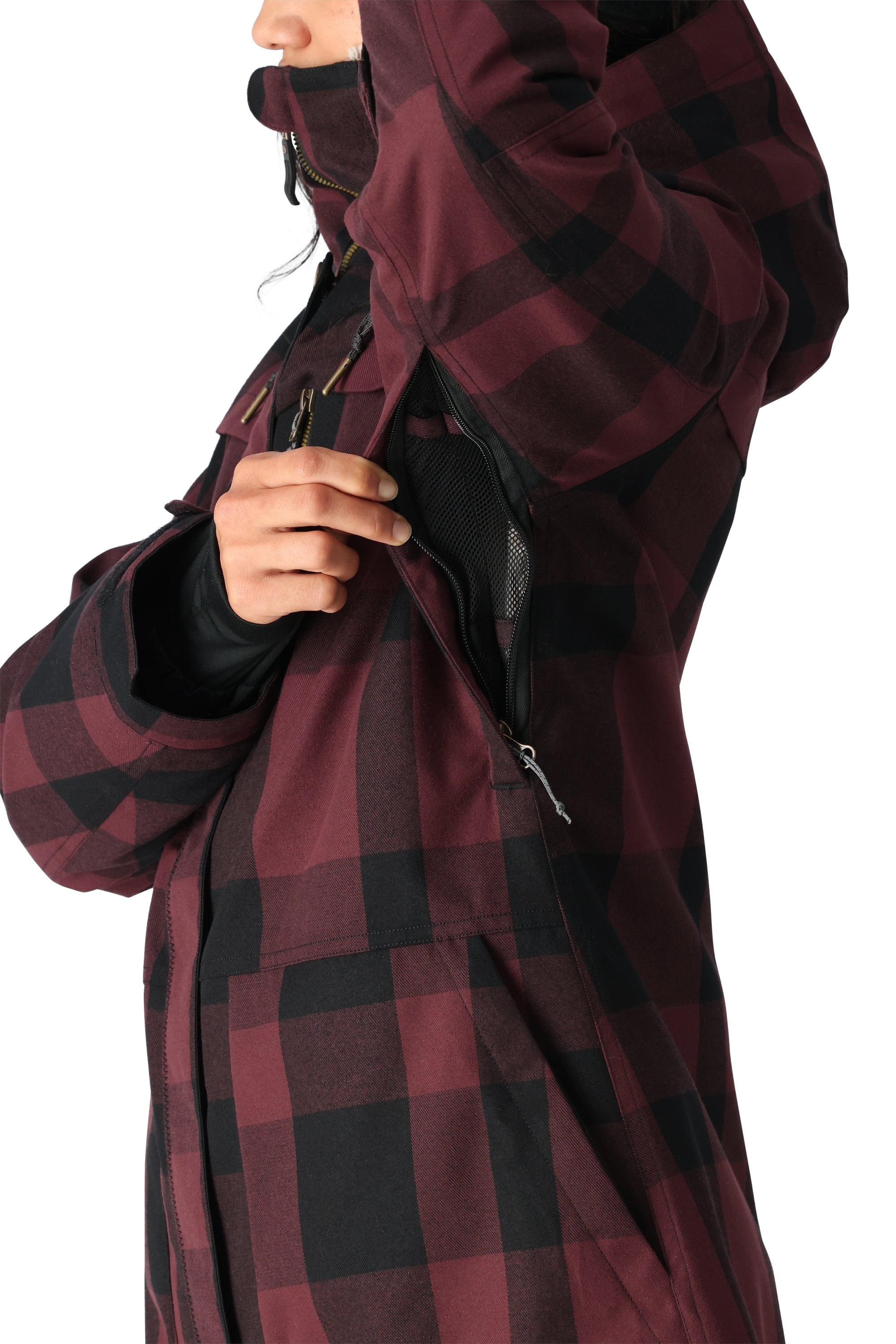 The 686 brand offers the Women's Spirit Insulated Jacket in a red and black plaid pattern.