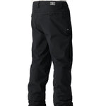 The 686 Men's Standard Shell Pant 2025 is black with a zippered pocket on the side.