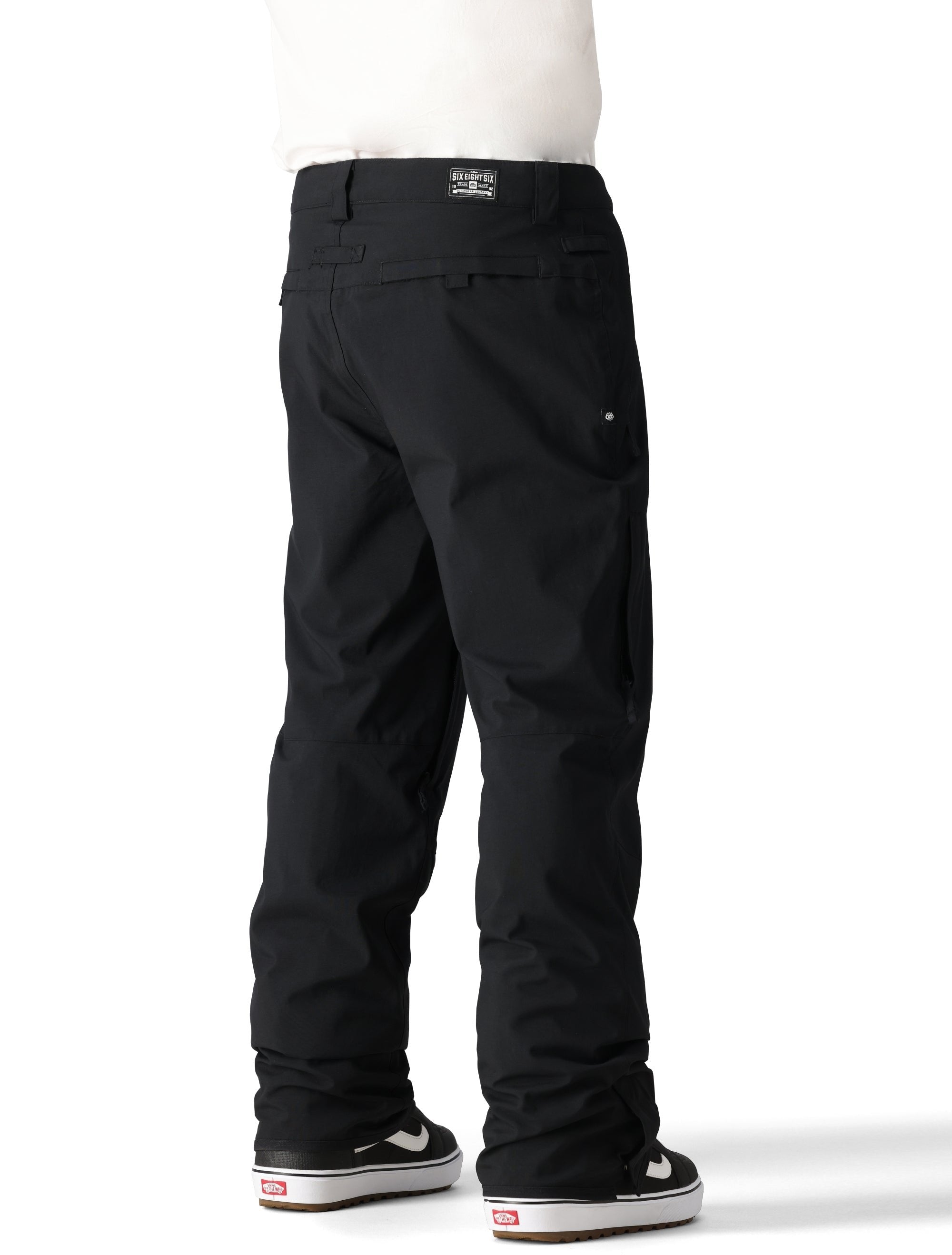 The 686 Men's Standard Shell Pant 2025 is black with a zippered pocket on the side.