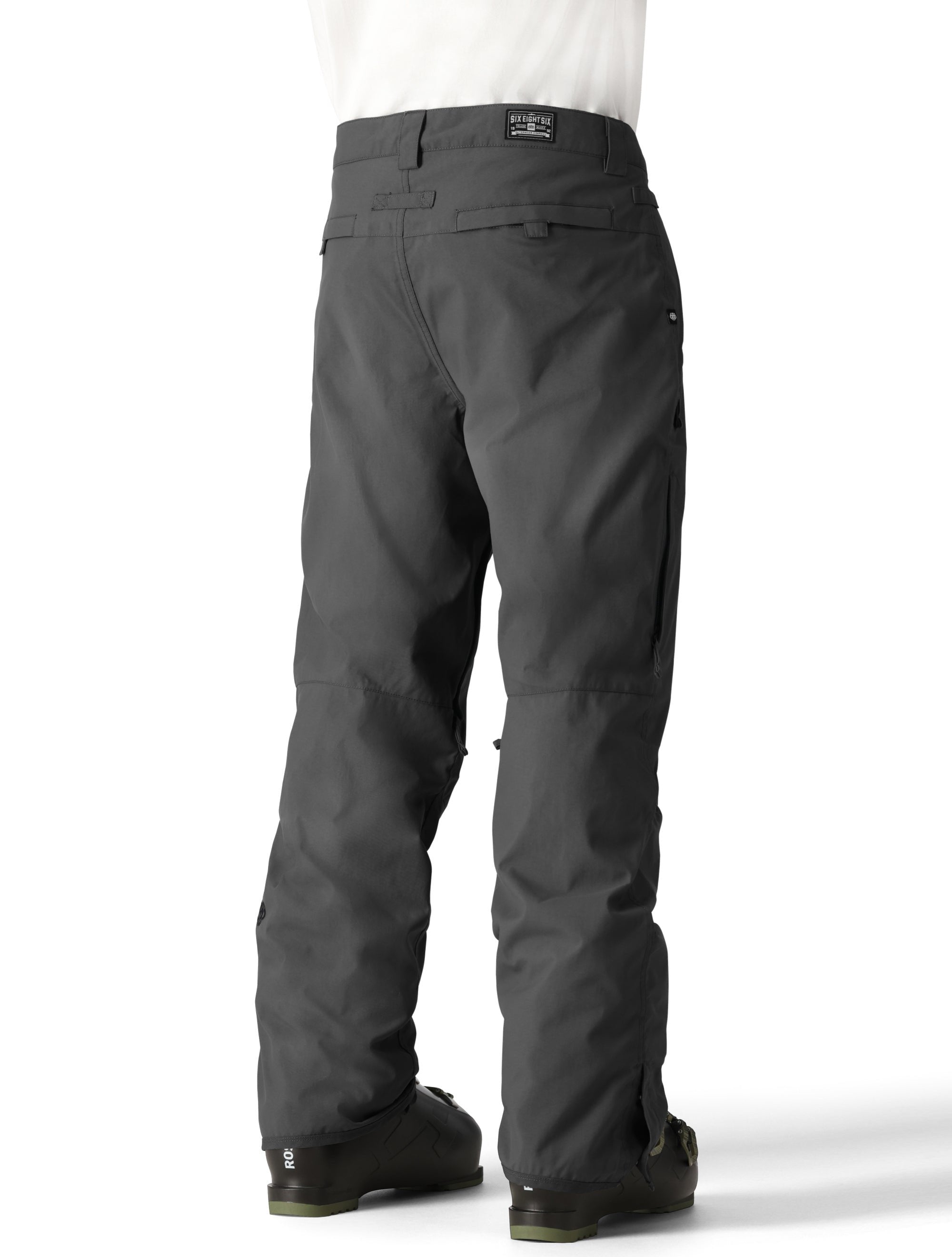 The 686 Men's Standard Shell Pant 2025 is black with a zip fly and belt loops.