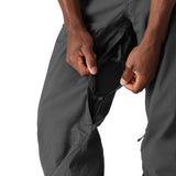 The 686 Men's Standard Shell Pant 2025 is black with an adjustable waistband and zippered side vents.
