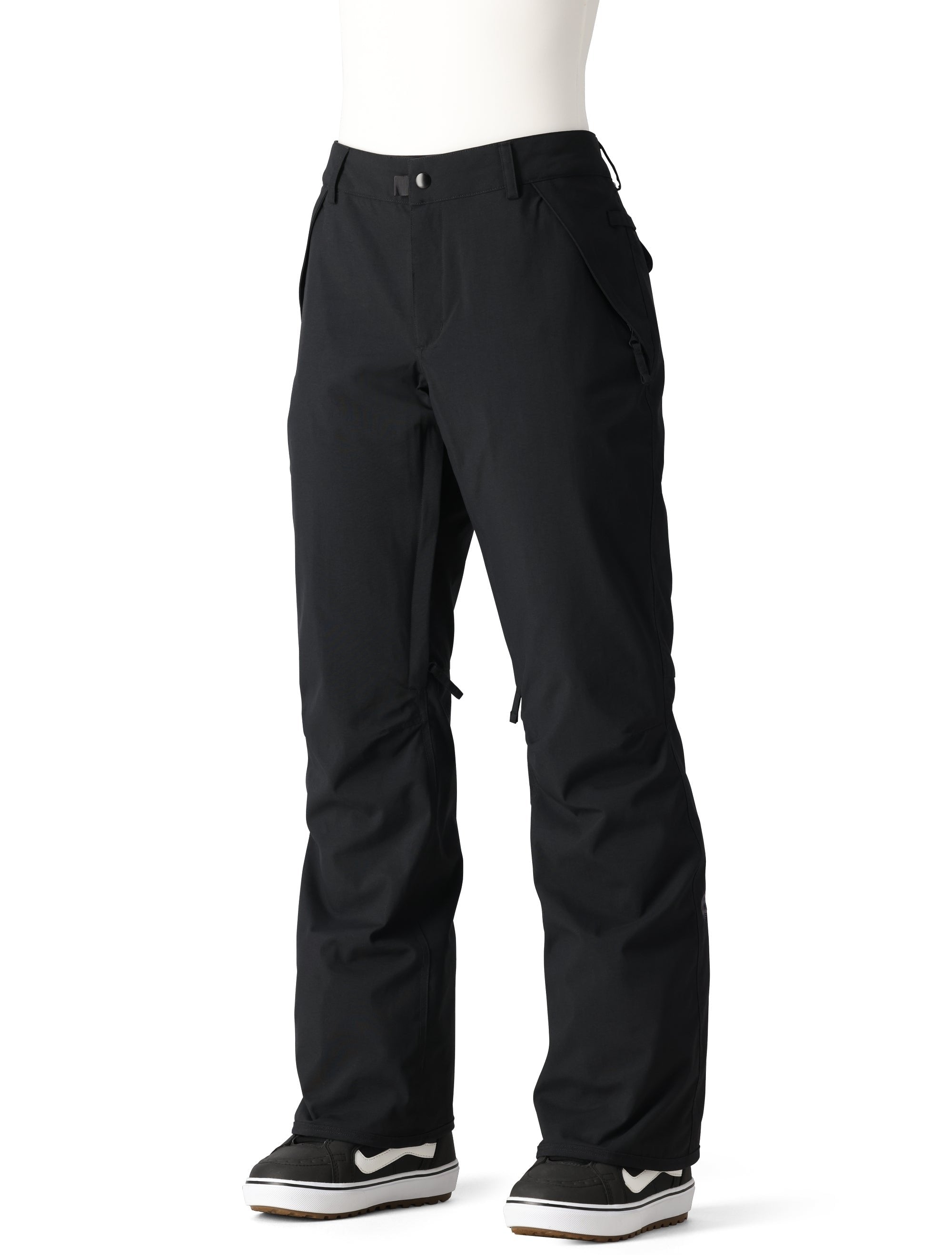 The 686 Women's Standard Shell Pant 2025 is black with a zippered fly and adjustable belt.
