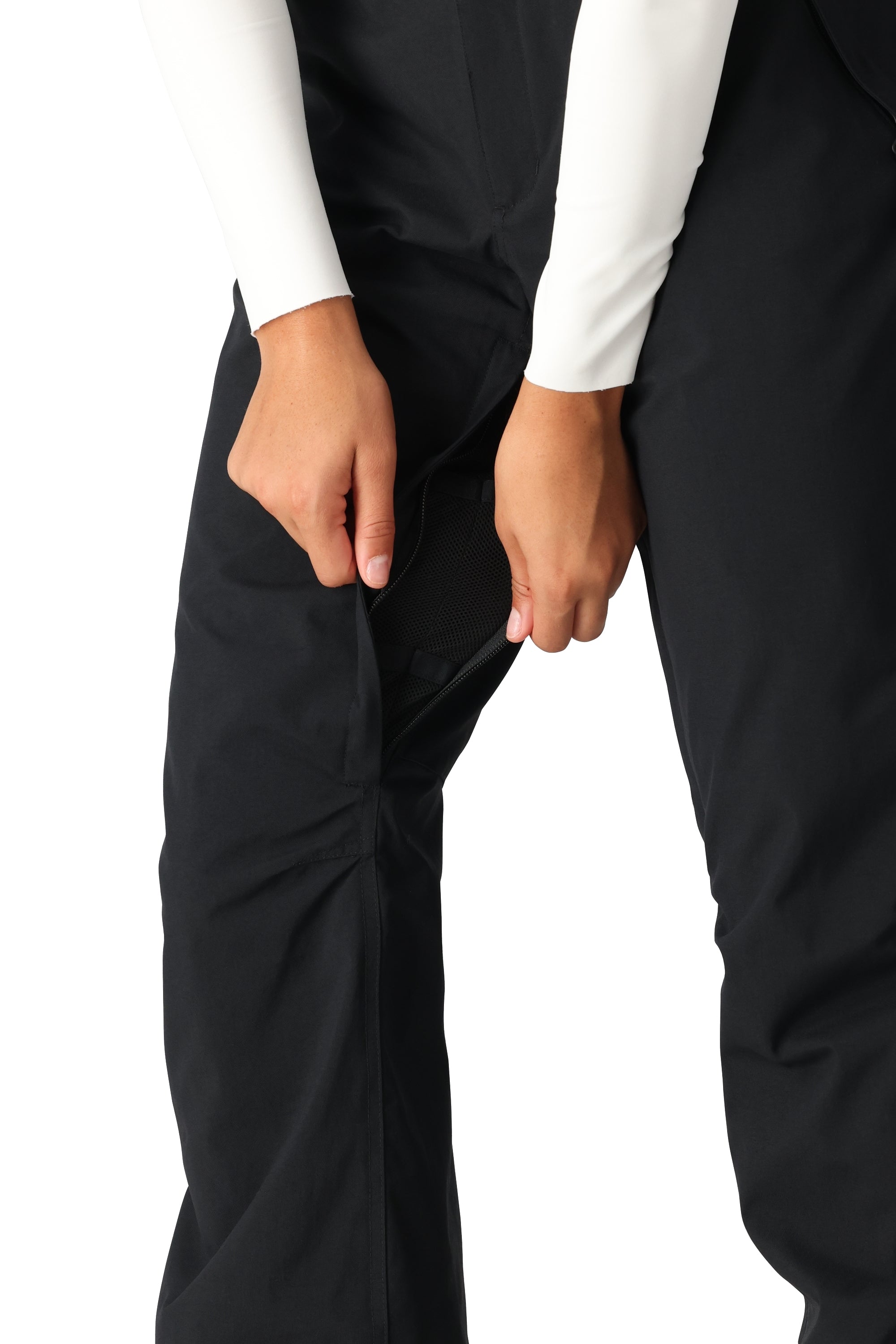 The 686 Women's Standard Shell Pant 2025 is black with a zippered thigh pocket and adjustable velcro waist tab.