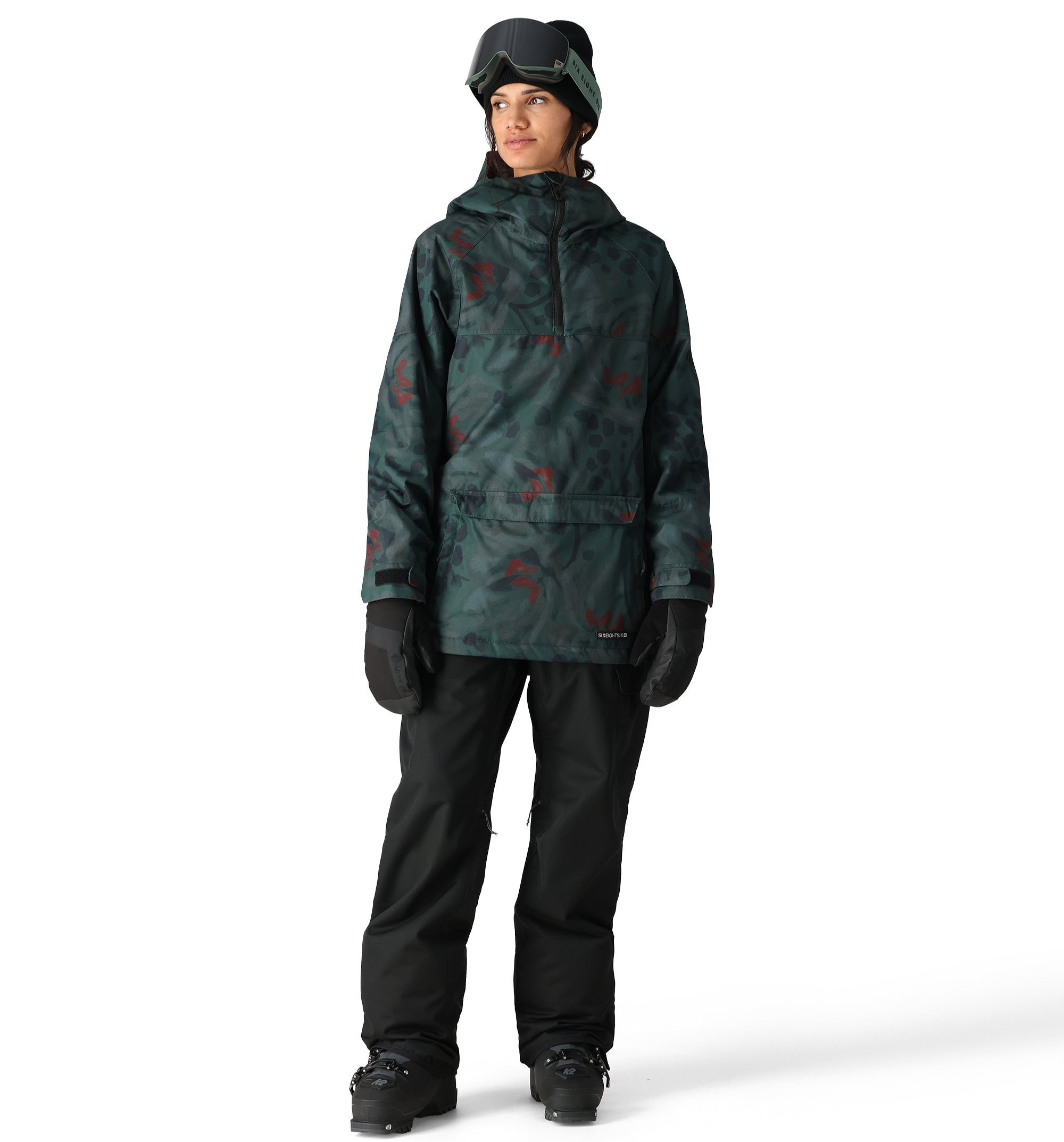 The 686 Upton Insulated Anorak Jacket is shown in a green and red floral pattern with a hood.