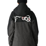 The 686 Women's Upton Insulated Anorak Jacket 2025 is black and gray with a hood, featuring an insulated design.