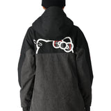 The 686 Women's Upton Insulated Anorak Jacket 2025 is black and gray with a hood, featuring an insulated design.