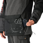 The 686 Women's Upton Insulated Anorak Jacket in black has an insulated hood and a zipper closure.