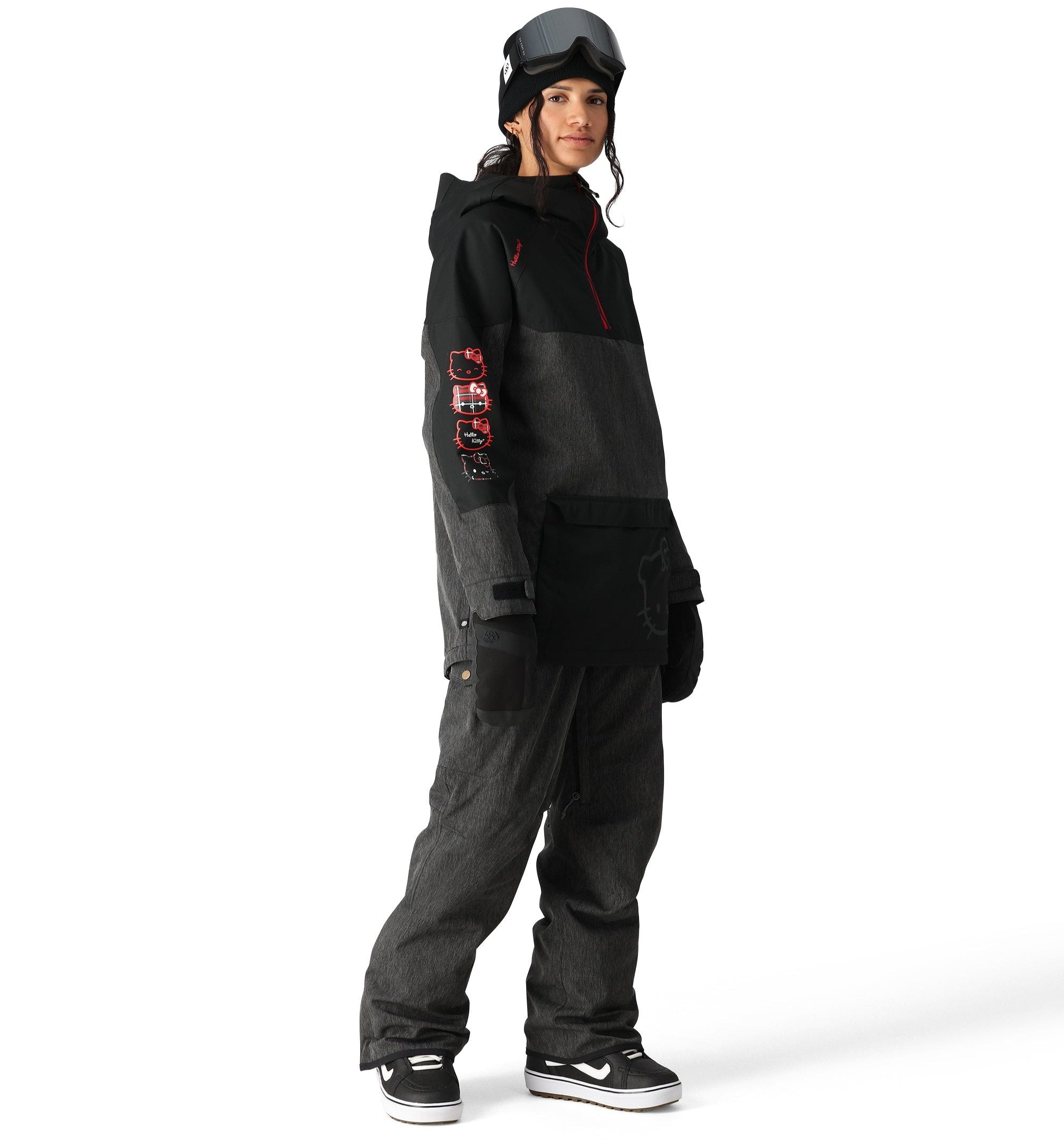 The 686 Women's Upton Insulated Anorak Jacket 2025 is black with red accents and a zippered front.