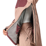 The 686 Women's Upton Insulated Anorak Jacket 2025 is a tan and maroon jacket with an insulated hood, as seen from the front view.