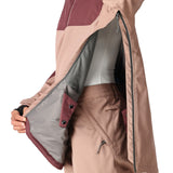 The 686 Women's Upton Insulated Anorak Jacket 2025 is a tan and maroon jacket with an insulated hood, as seen from the front view.