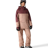 The 686 Upton Insulated Anorak Jacket 2025 is primarily in tan with maroon accents on the upper portion.