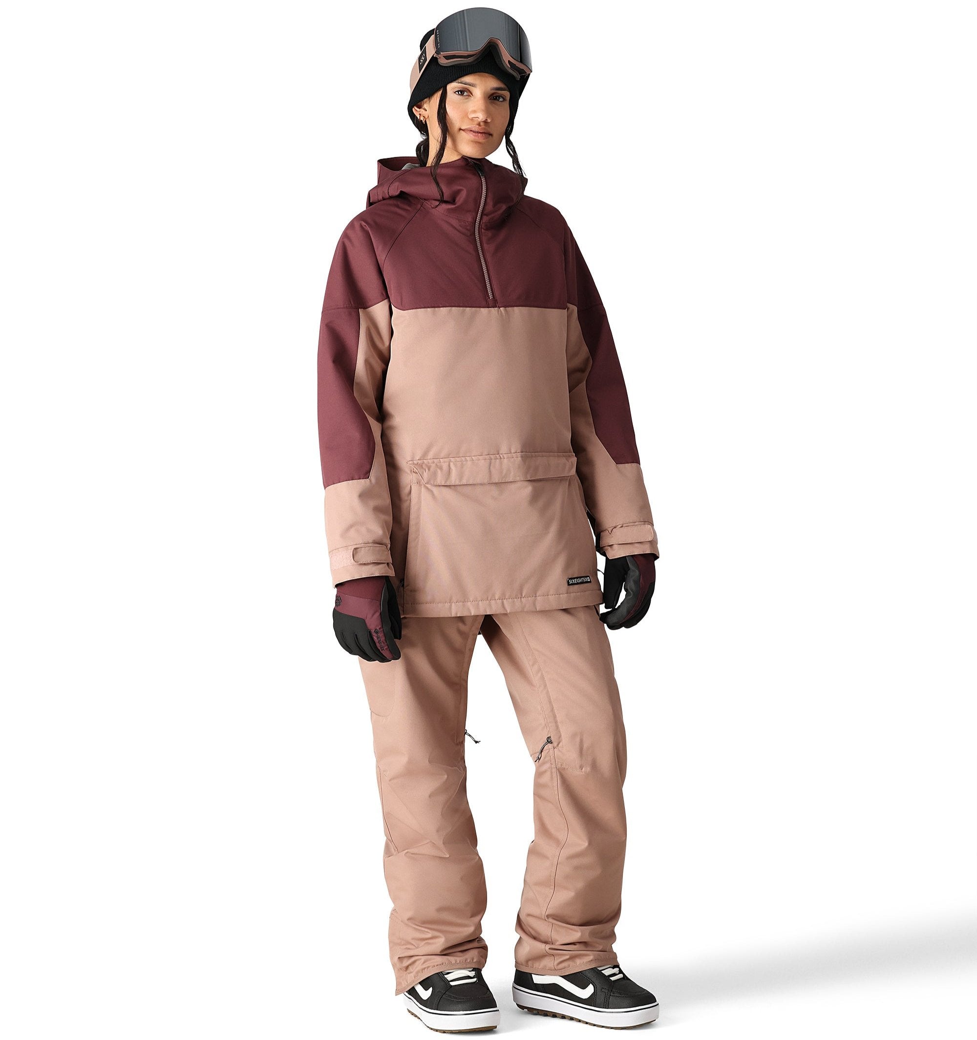 The 686 Upton Insulated Anorak Jacket 2025 is primarily in tan with maroon accents on the upper portion.